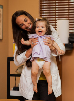 Dr. Nina with pediatric patient