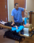 Dr. Joe Bogart Adjusting a Patient