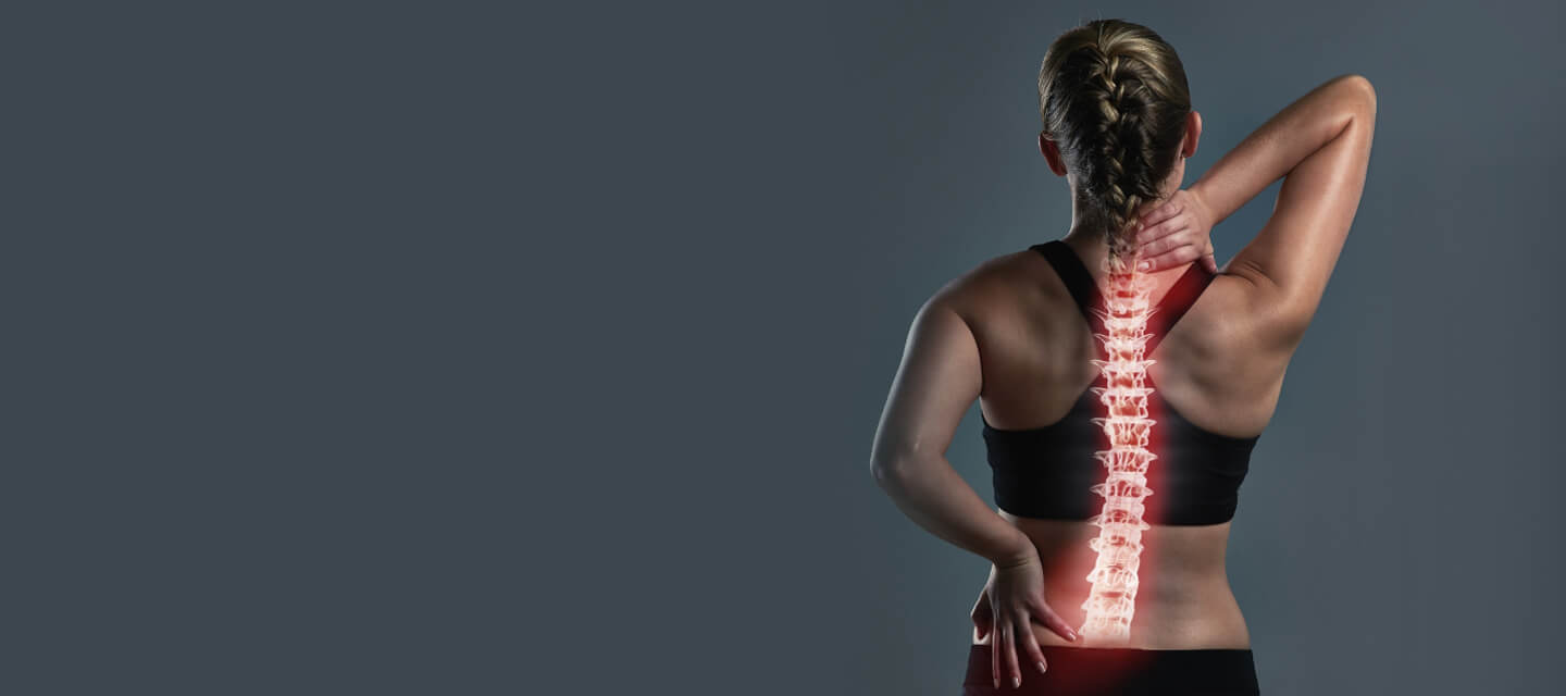 Spine overlay on female patient's back