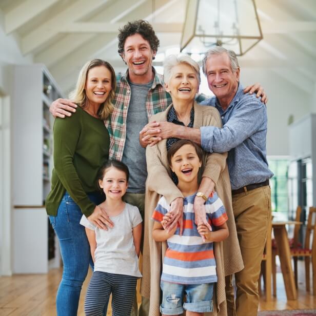 Multi-gen family posing for a photo