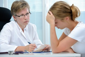 depressed woman with her doctor