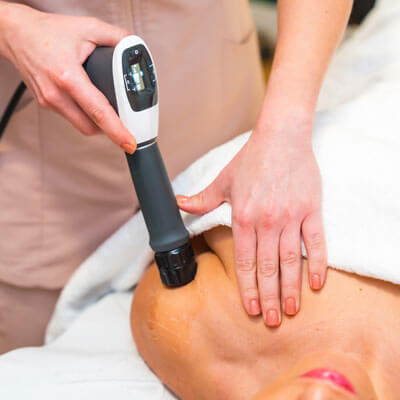 shockwave therapy on patients shoulder