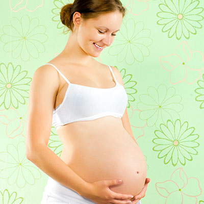 smiling pregnant person