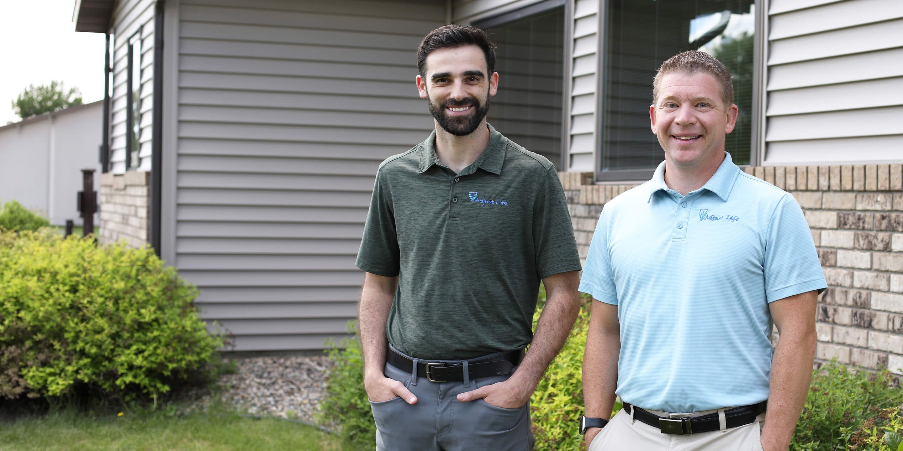 our Bismarck chiropractors smiling outdoors