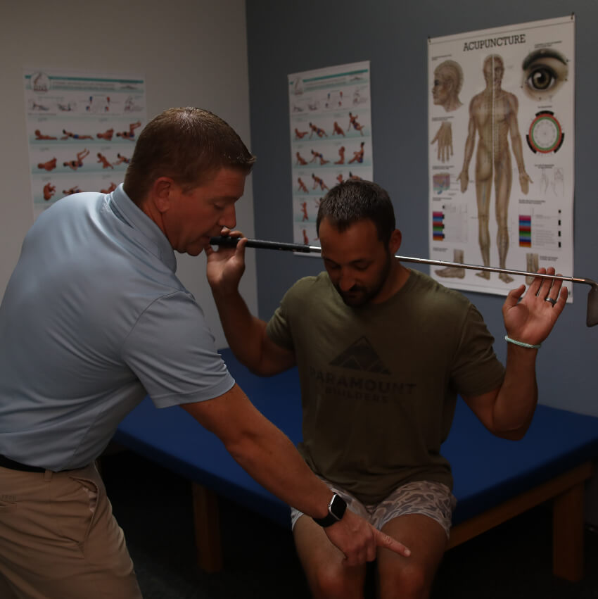 doctor talking with a golfer