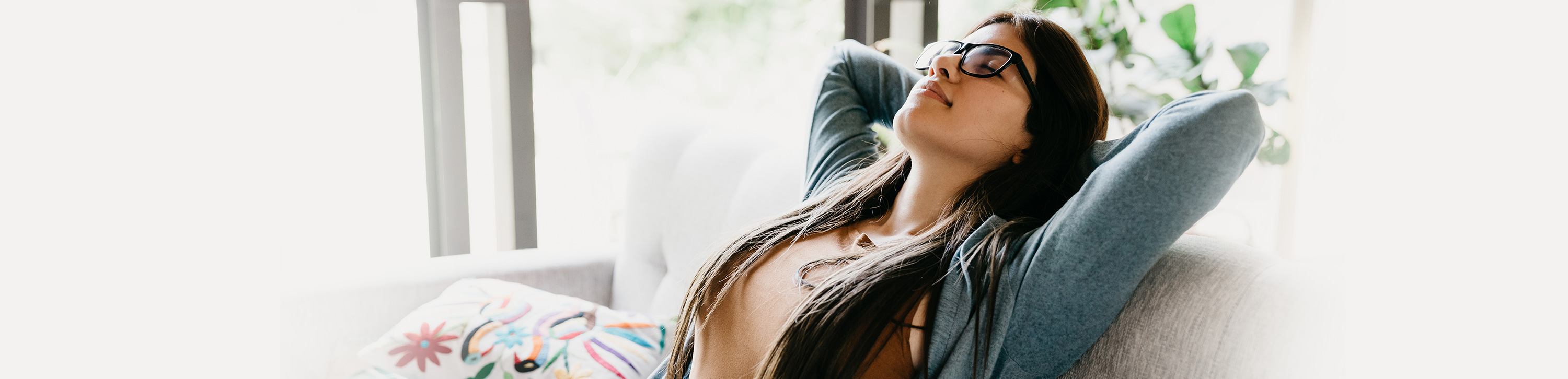 Woman relaxing with eyes closed