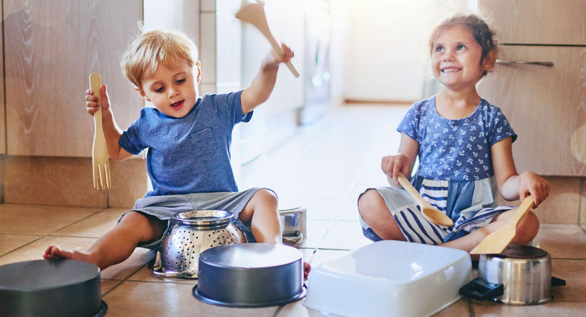 Children using pots as instruments