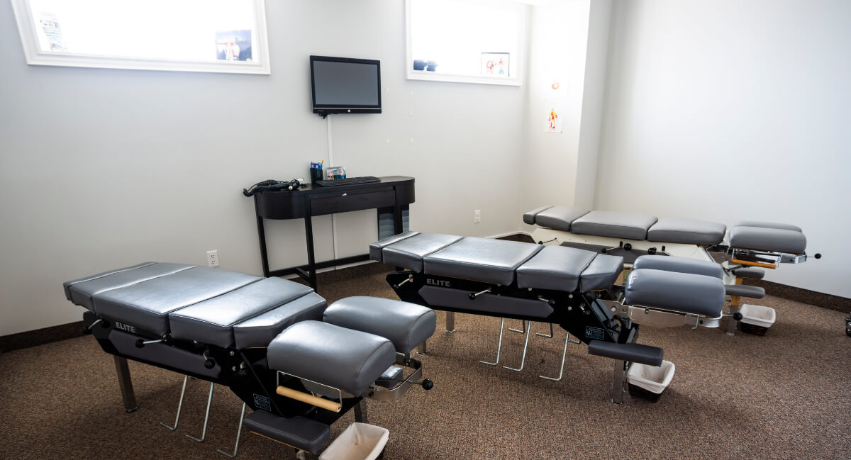 Chiropractic adjustment tables