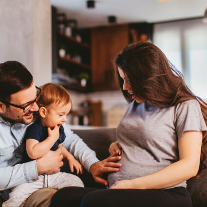 Pregnant mom with happy family