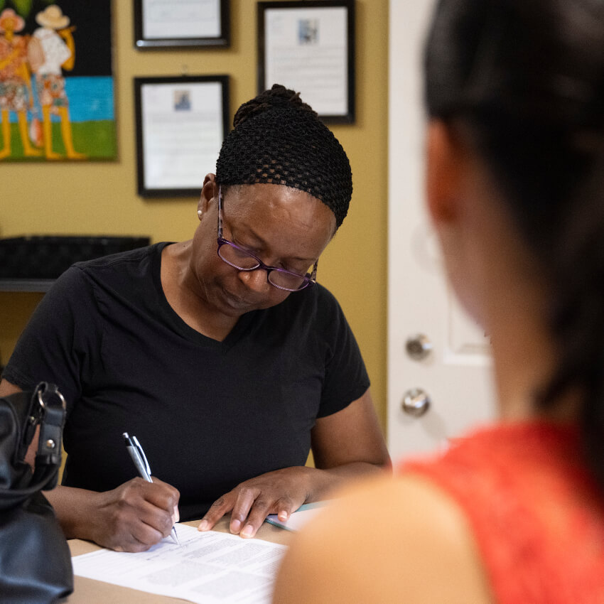 patient doing paperwork