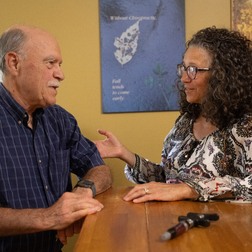 Dr K speaking with patient