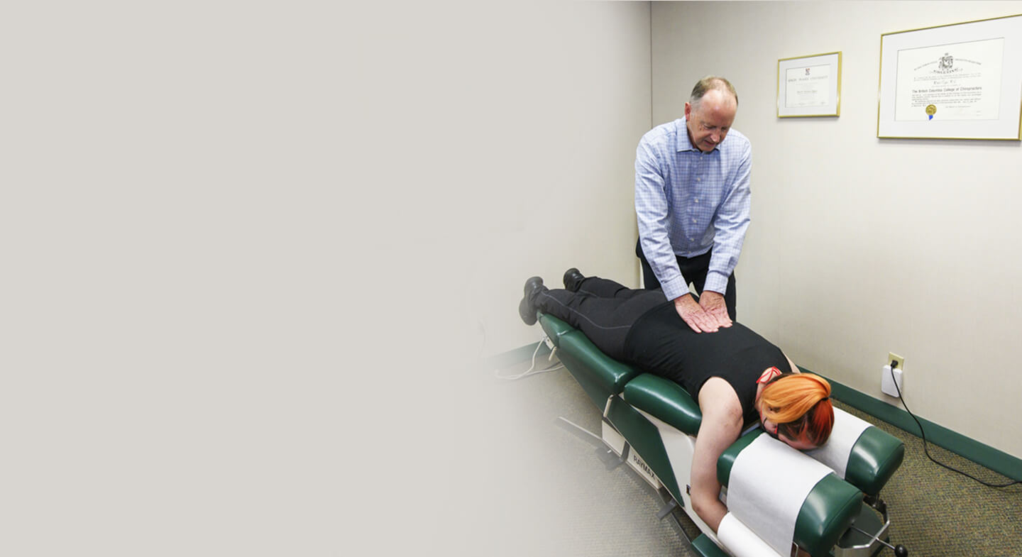 Dr. David adjusting patient