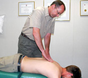 Dr. Scott adjusting a patient.