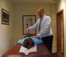 Dr Ed Bates adjusting a patient.