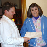 Dr holding paperwork