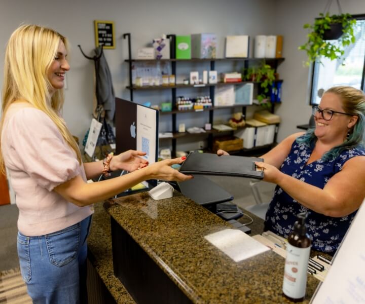 Virginia Beach patient checking in at Atlantic Coast Chiropractic