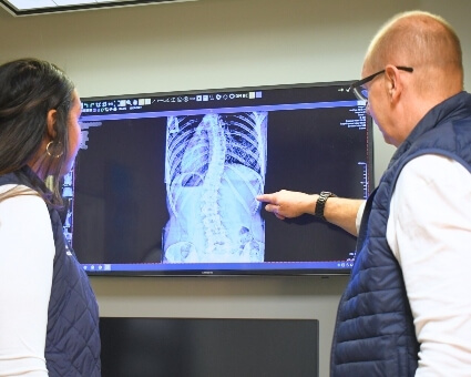 Dr. Goebel reviewing x-ray