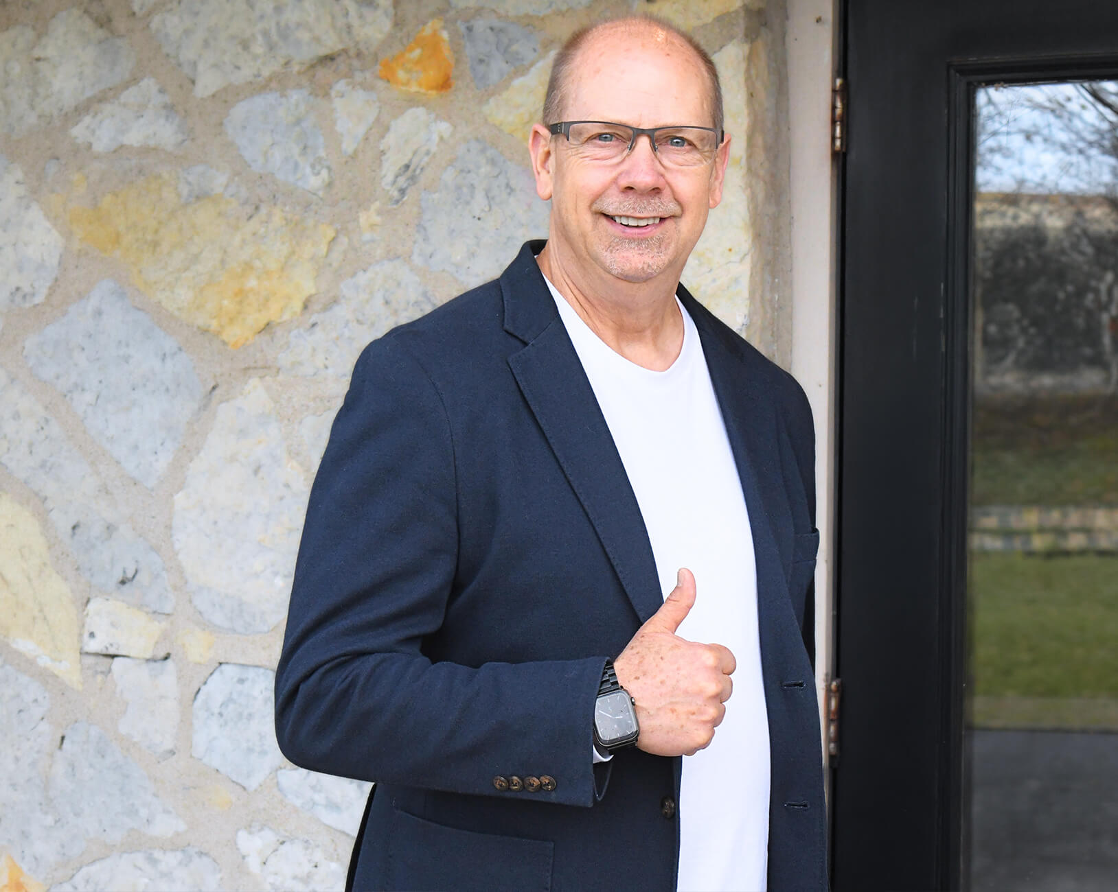 Fort Wayne chiropractor Dr. John Goebel giving a thumbs-up