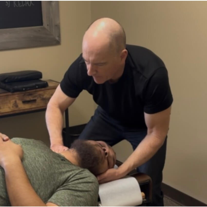 Dr RIch adjusting patients neck