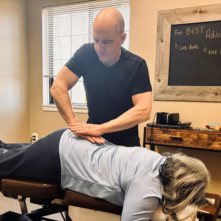 Dr RIch adjusting patients back