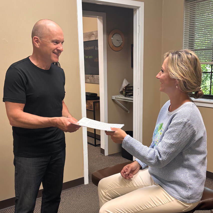 Dr Rich talking with patient