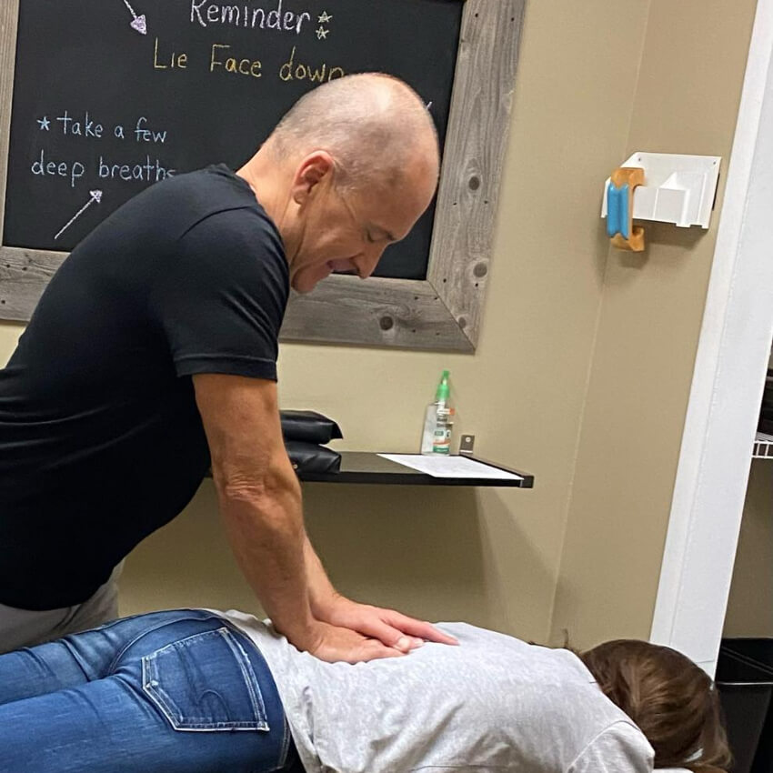 Dr RIch adjusting patients back