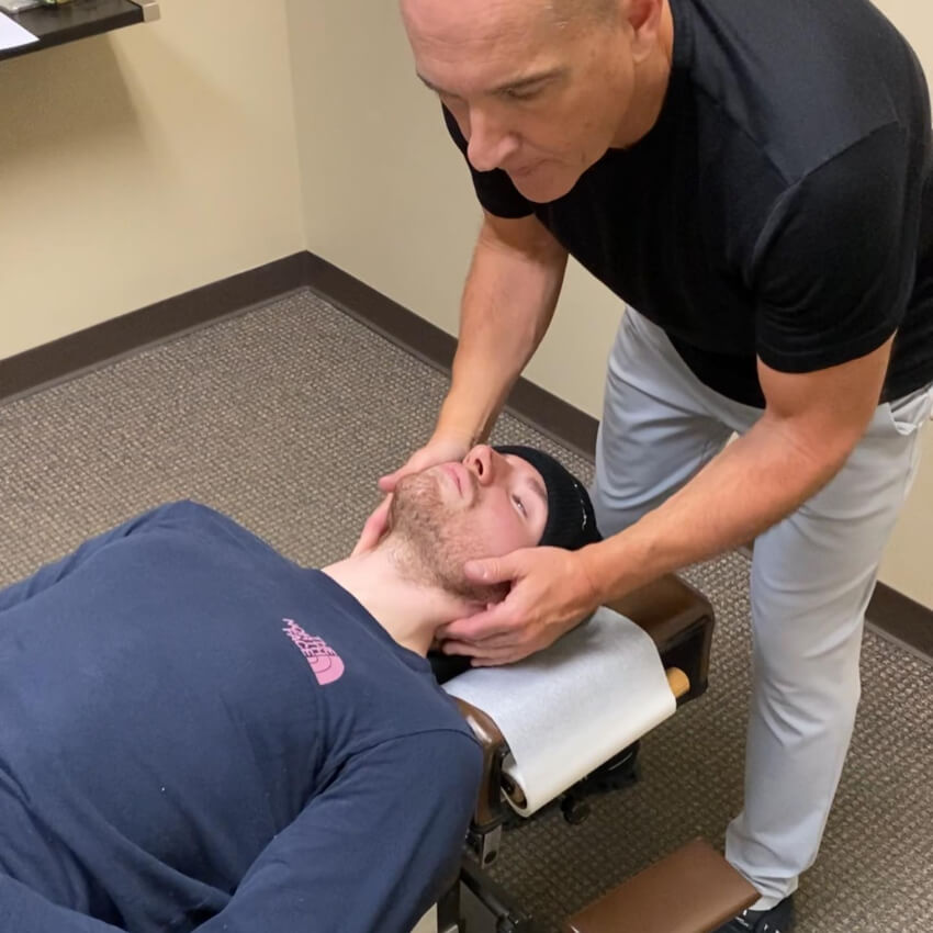 Dr RIch adjusting patients neck