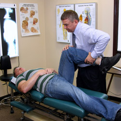 Dr. Bottorff conducting a McMurray orthopedic test.