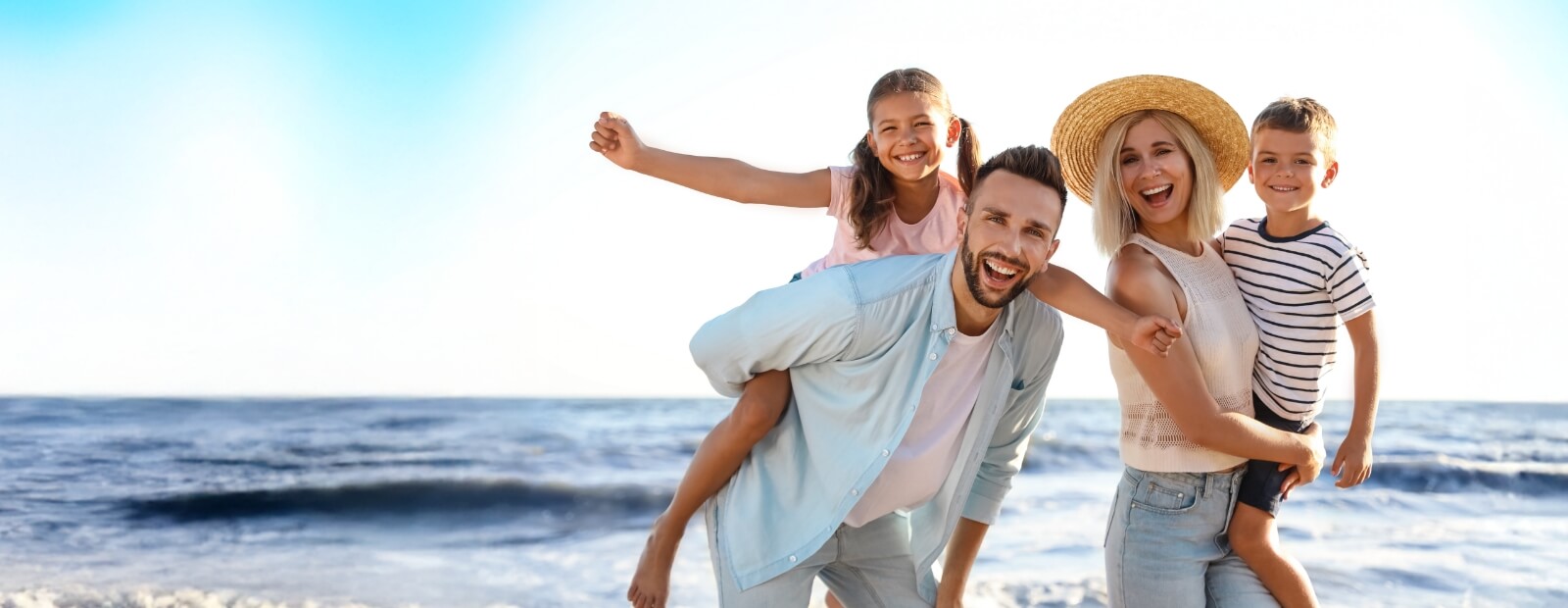 Smiling family of four
