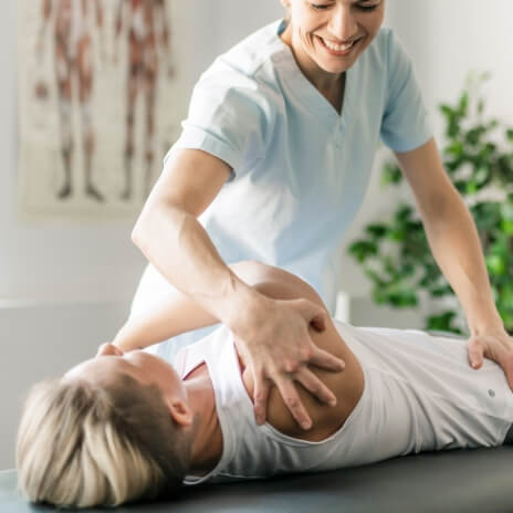 person on table during back adjustment