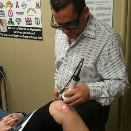 Dr. Lee using laser