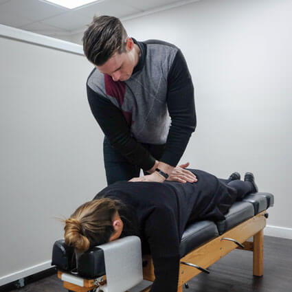 Chiropractic adjustment of back