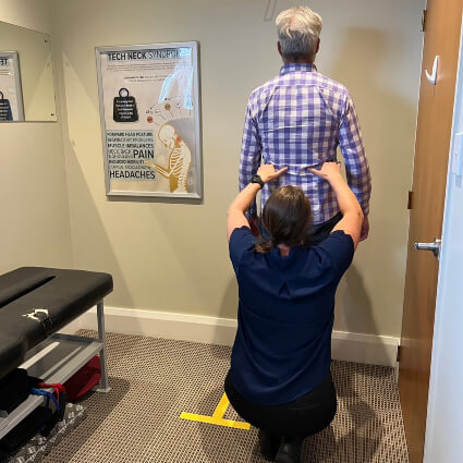 Christchurch chiro checking patient posture