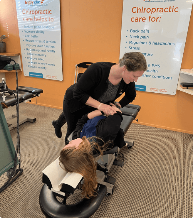 Christchurch female patient getting adjusted at Happy Spine