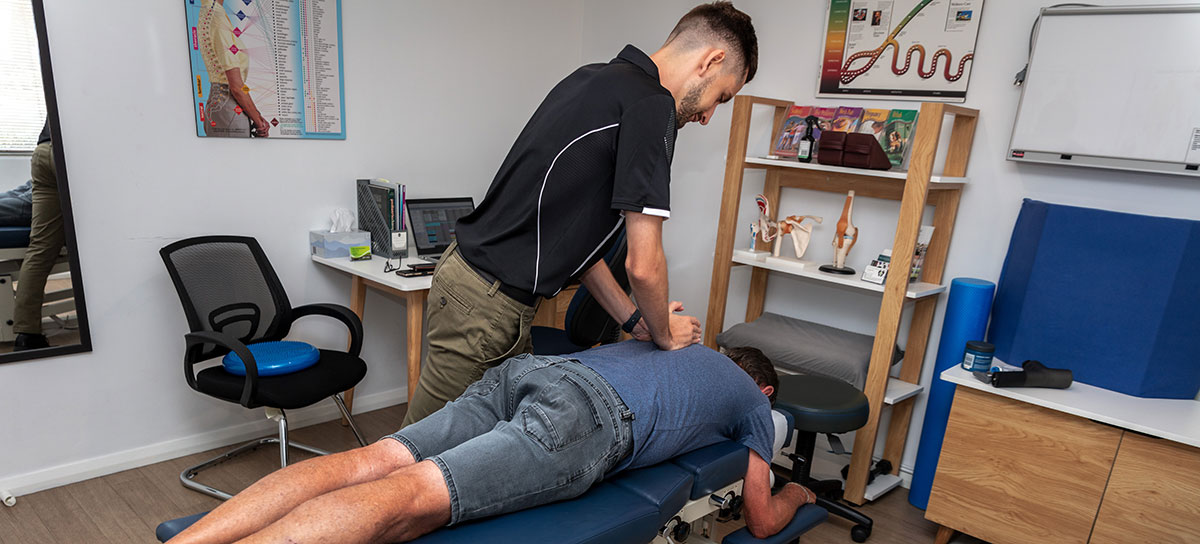 Man getting adjustment on table