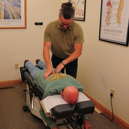 Lower-back adjustment for male patient