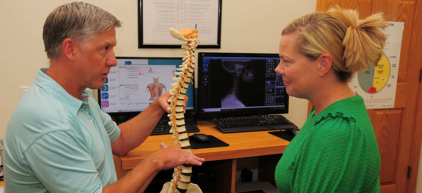 Marinette chiropractor in a consultation