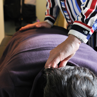 Doctor adjusting patient