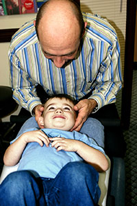 Dr. Rudy Enns with a Whitby chiropractic patient.