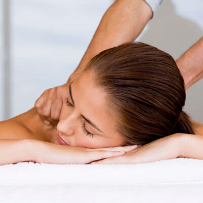 woman getting a shoulder massage