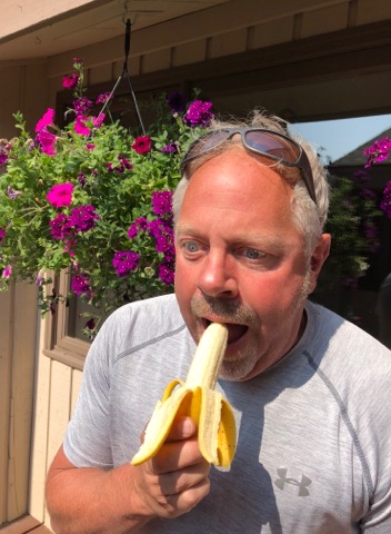 Ken eating banana