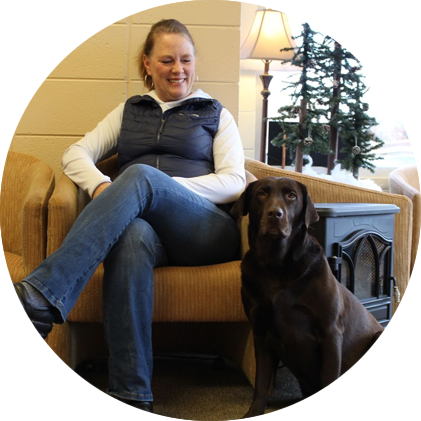 Woman and dog in waiting area