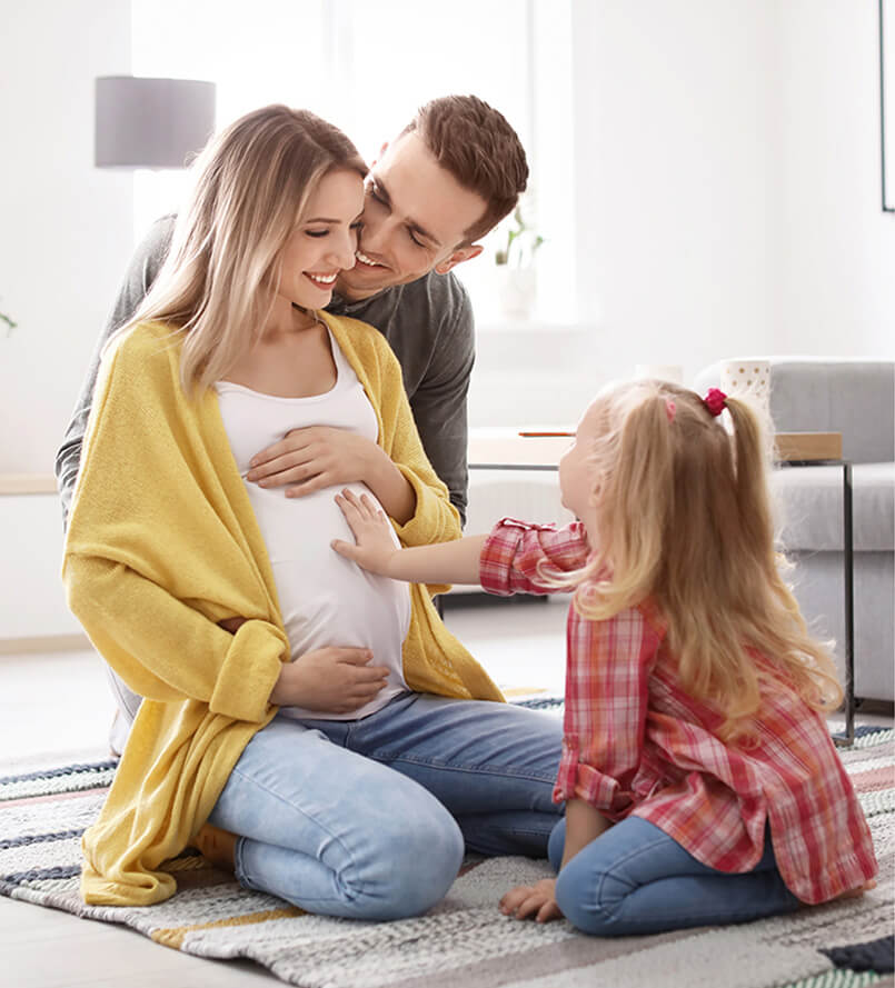 pregnant woman with family