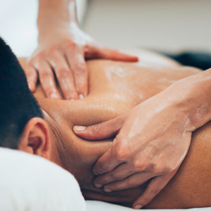 Male patient receiving a massage