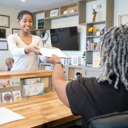 patient checking in at our front desk