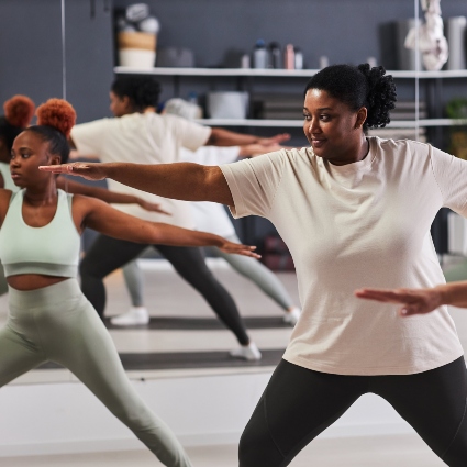 women doing yoga together