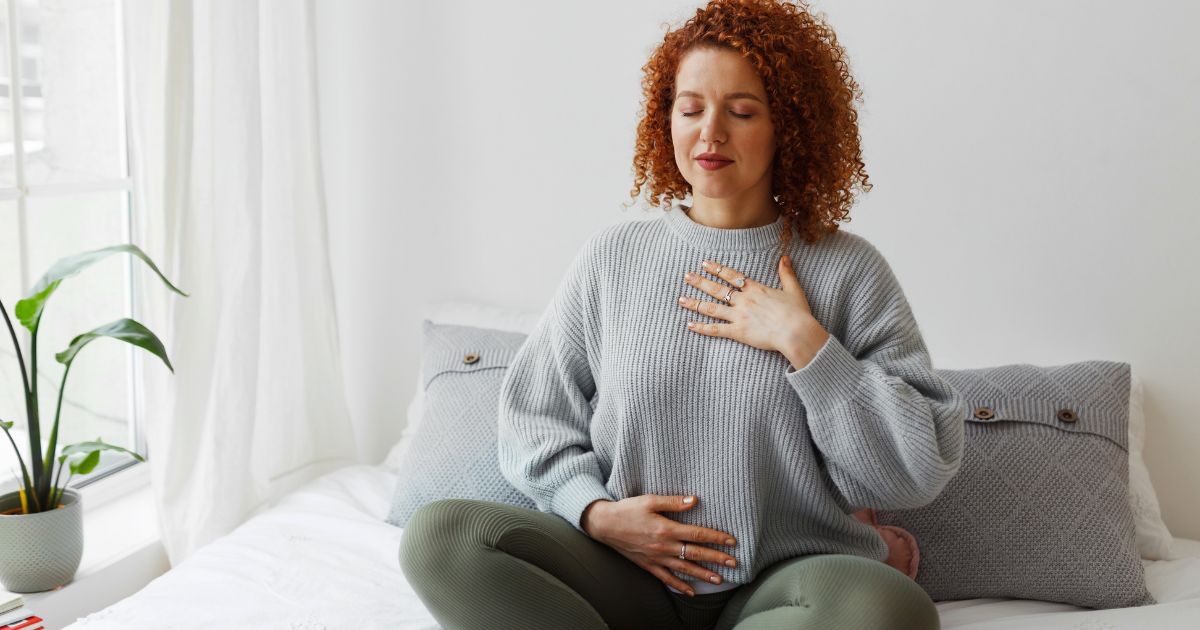 Woman taking relaxing breaths