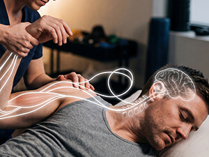man having arm adjusted with brain illustration on his head