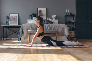 woman doing cobra pose