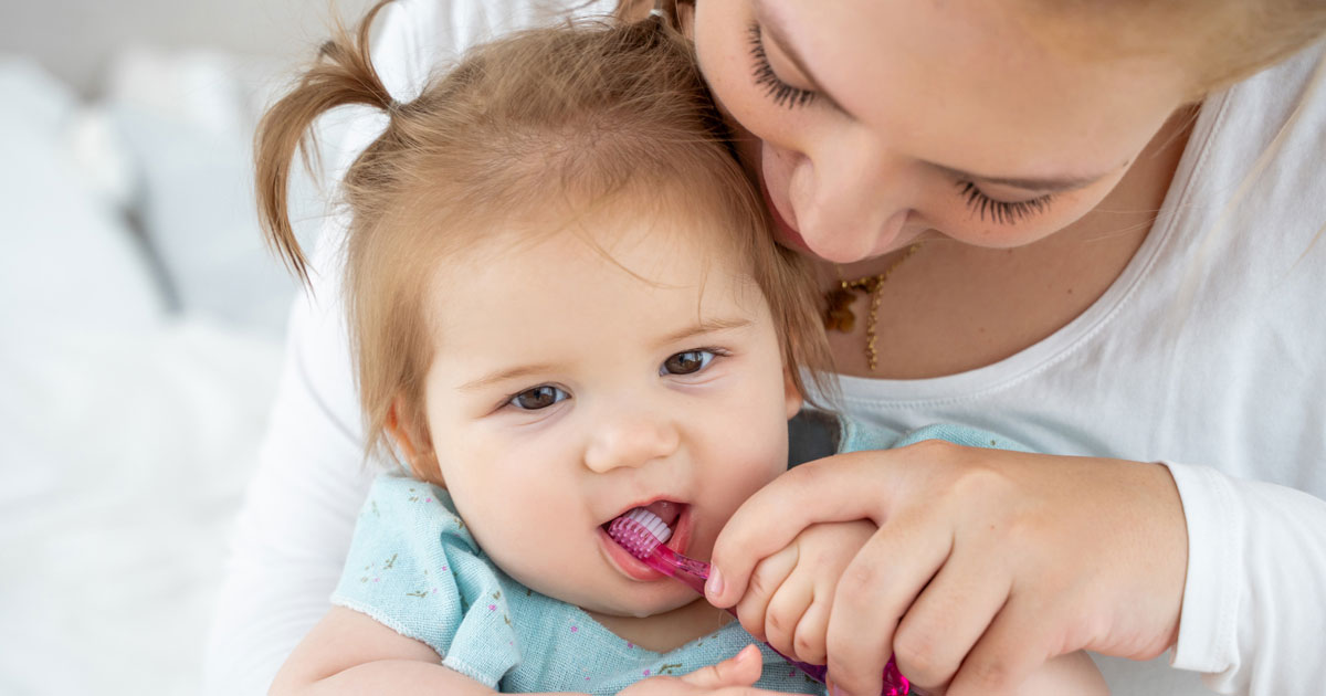 Brushing toddler's teeth